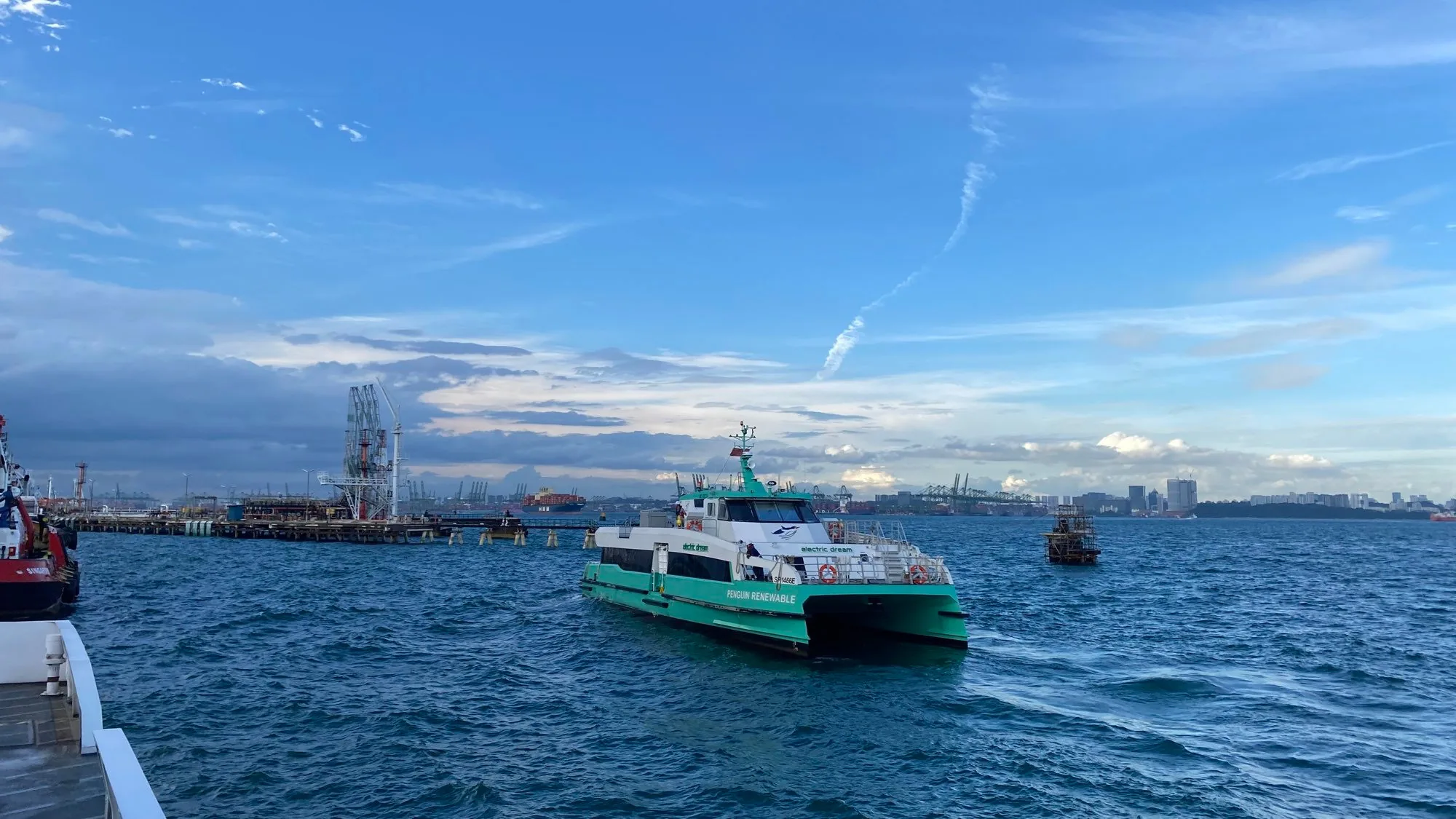 Battery-electric ferry under way off Bukom island